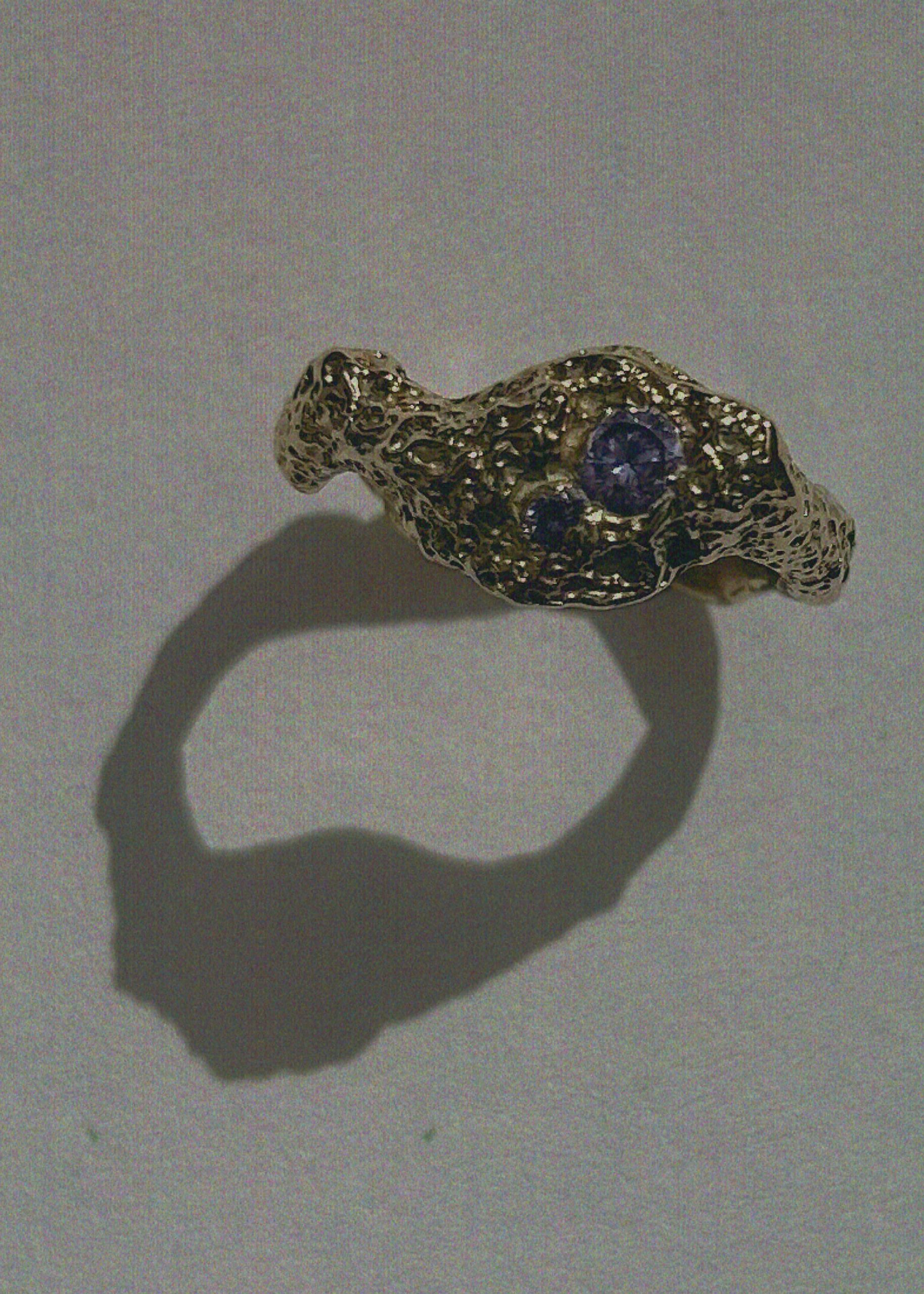 raw textured one of a kind ring with purple lab grown gems