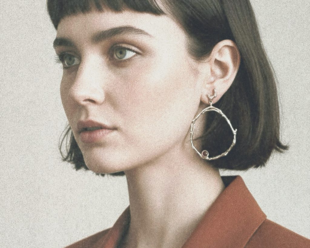 statement earrings with organic surfaces